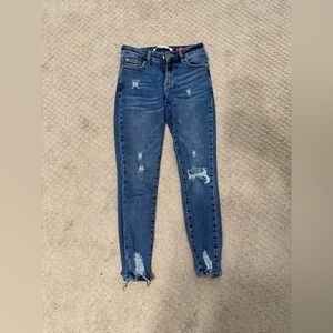 Medium to dark wash wears with rips